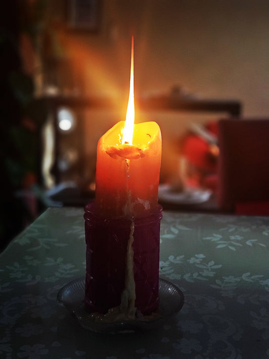 La veladora encendida