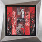 Lienzo abstracto geométrico en rojo y negro enmarcado en una estructura plateada angular - Cuadro moderno - Impenetrable
